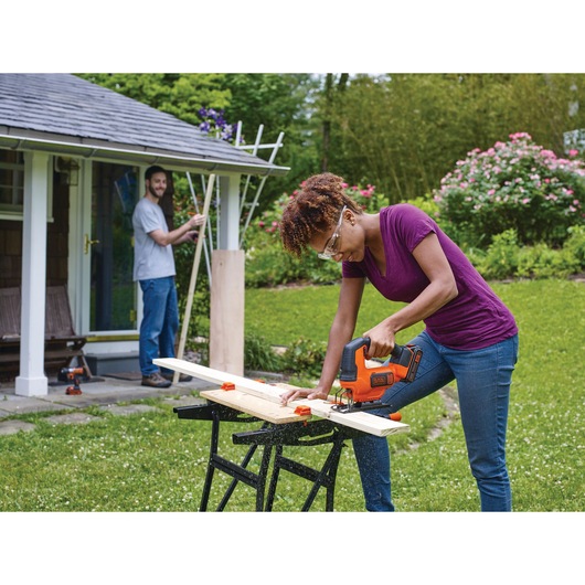 Cordless Jigsaw being used for cutting plywood.